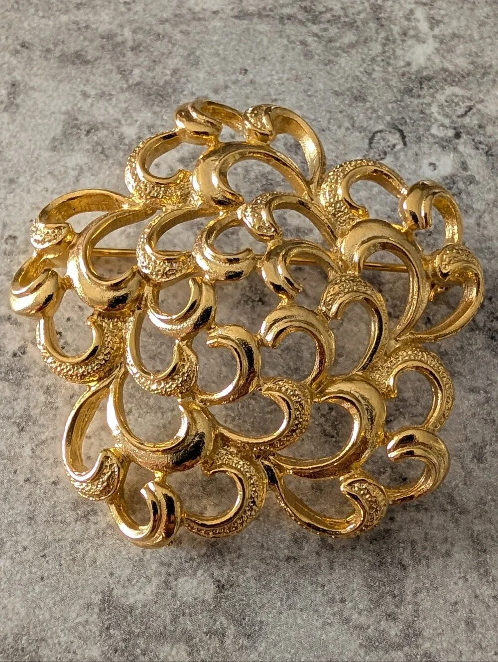 Gold Tone Textured Floral Openwork Or Scroll Design Brooch